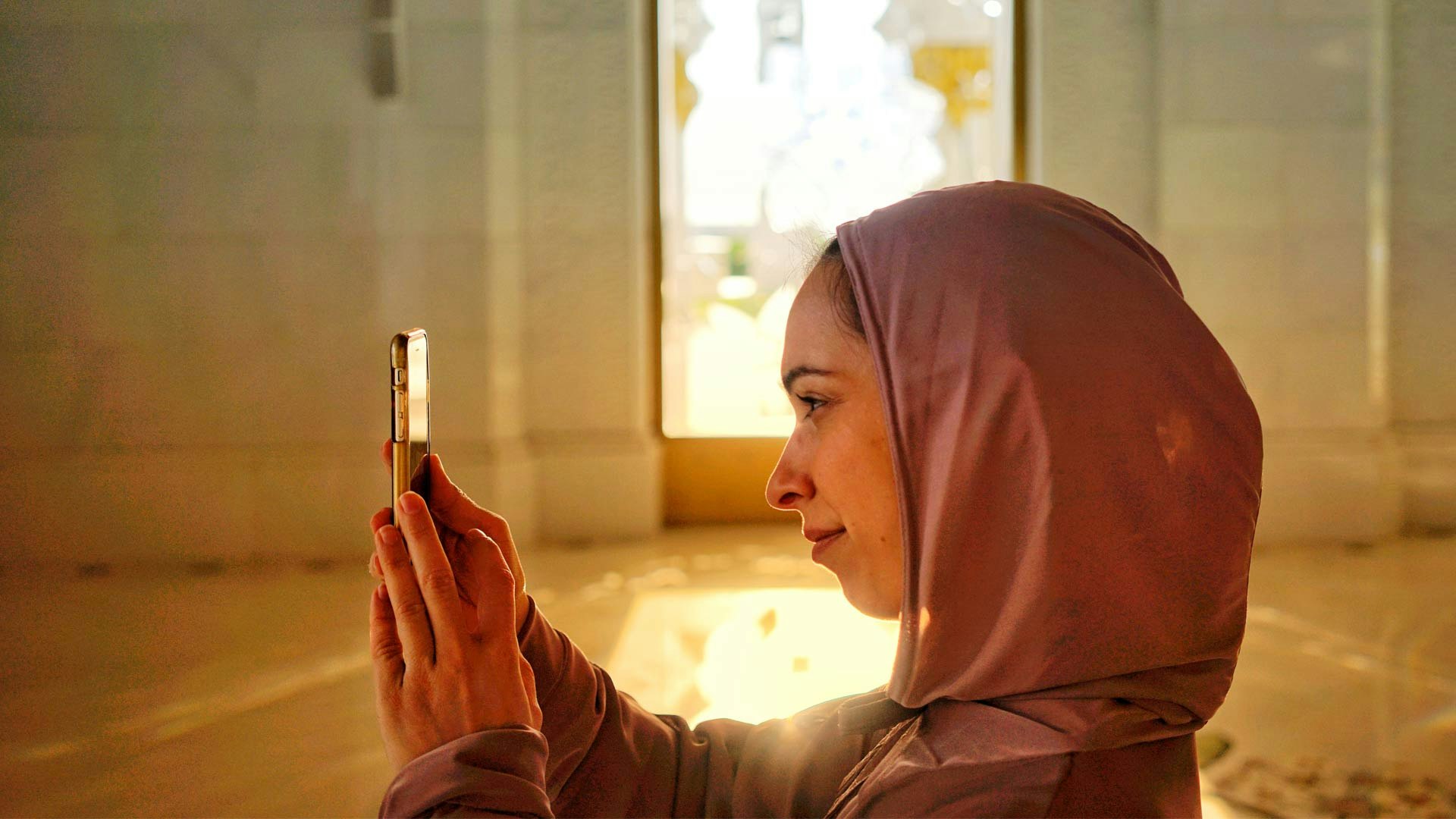 woman looking at phone